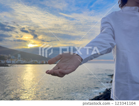 Jesus Christ giving his arm, hand gestures of Jesus dying on the cross and resurrected 123341104