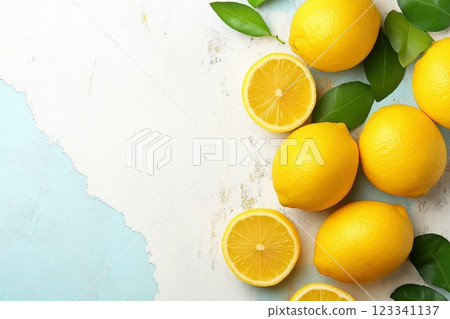 Fresh lemons on two tone background, top view. Ripe fruit Fresh lemons on two tone background, top view. Ripe fruit 123341137