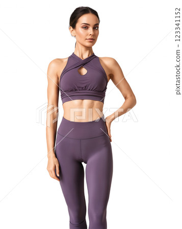 luxurious dark purple yoga top with a built-in bra and an open back design with a knot detail. The stretchy 123341152