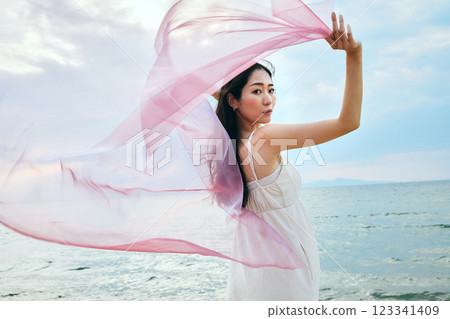 Woman looking at the summer sea 123341409