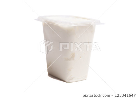 Plastic container with sour cream isolated on white 123341647
