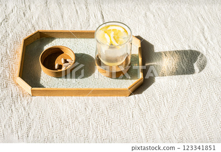 lemon water and nutritional supplement capsules for self care. lemon water and nutritional supplement capsules for self care. 123341851