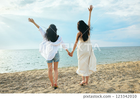 Woman looking at the summer sea 123342010