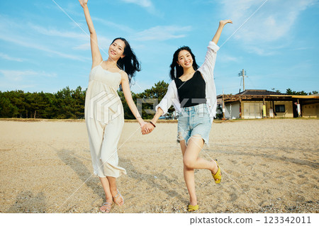 Woman looking at the summer sea 123342011