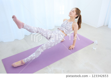 Woman doing yoga and pilates Woman doing yoga and pilates 123342653