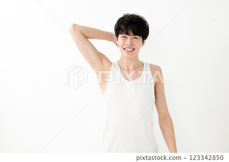 Smiling man, armpit hair removal, beauty 123342850
