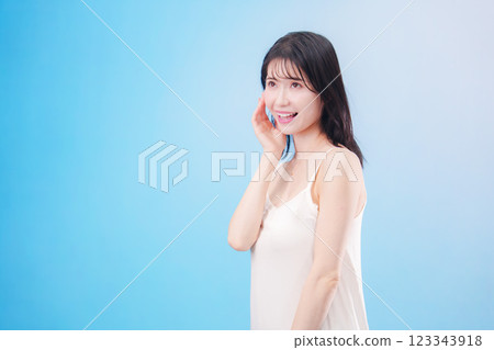 Young woman beauty image (light blue background) Young woman beauty image (light blue background) 123343918