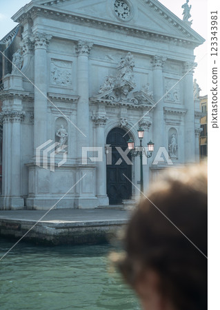 The majestic exterior of the Church of San Stae seen from the vaporetto 123343981