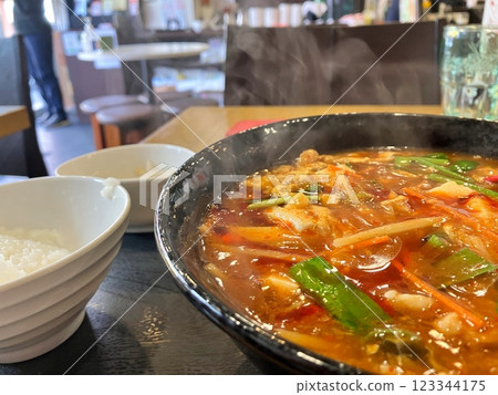 Steaming hot and sour noodles Hot and sour noodles set Steaming hot and sour noodles Hot and sour noodles set 123344175