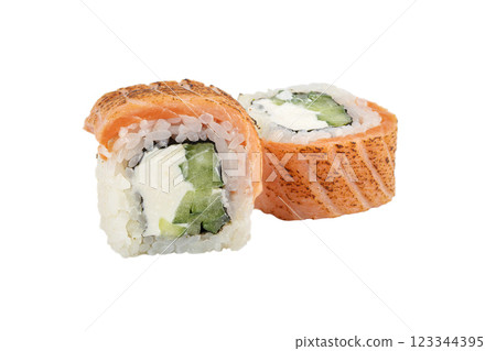 Sushi closeup isolated on white background. Sushi roll with red fish, trout, Philadelphia cheese and daikon. Japanese restaurant menu. 123344395
