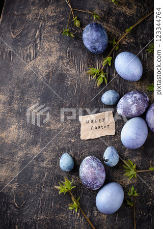 Festive Easter eggs in purple and blue color 123344764