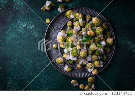 Frozen Brussels sprouts on dark background 123344793