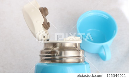 Water bottle with cup Water bottle with cup 123344921