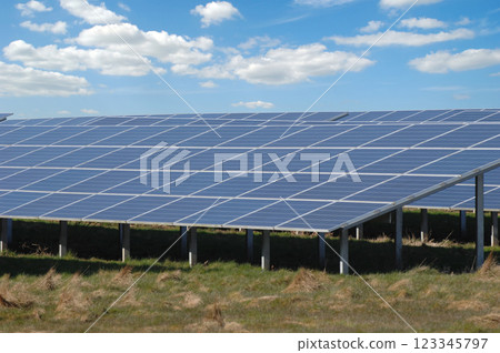 Rows of solar panels and green nature Rows of solar panels and green nature 123345797