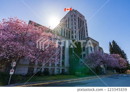 Vancouver City Hall with cherry blossoms in full bloom. Canada spring time season photography. Vancouver City Hall with cherry blossoms in full bloom. Canada spring time season photography. 123345839