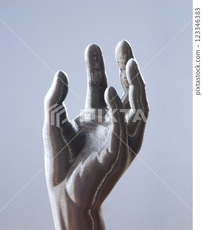 Art objects human hand printed on 3D printer. Interior model created on 3D printer from molten plastic. 3D printing technology. Additive modern new progressive technologies. FDM technology Art objects human hand printed on 3D printer. Interior model created on 3D printer from molten plastic. 3D printing technology. Additive modern new progressive technologies. FDM technology 123346383