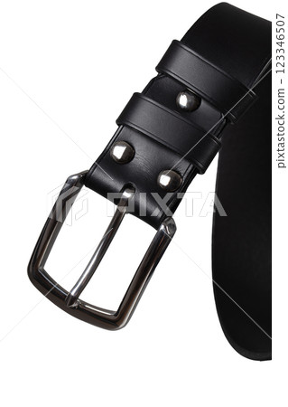 Part of a leather belt with a metal buckle close-up isolated on a white background. 123346507