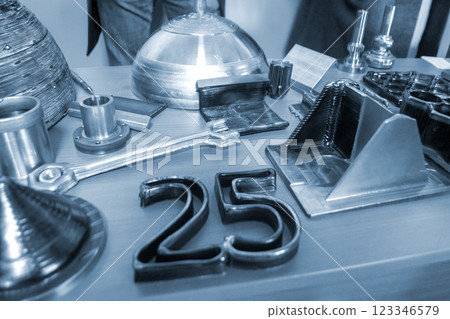 Object printed by 3D printer from metal. Additive manufacturing solution. Object created on 3Dprinter from melting metal thread. 3D Metal Printing. Metal additive manufacturing 123346579