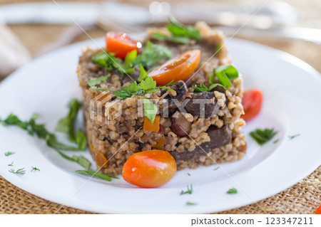 cooked bulgur with mushrooms and vegetables 123347211