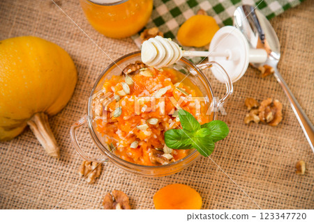Nutritious Breakfast of Pumpkin with Rice and Nuts Nutritious Breakfast of Pumpkin with Rice and Nuts 123347720