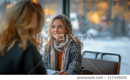 Patient talking to doctor, middle aged woman in doctor's office during consultation with specialist after screening, concept of timely annual health checkup Patient talking to doctor, middle aged woman in doctor's office during consultation with specialist after screening, concept of timely annual health checkup 123348008