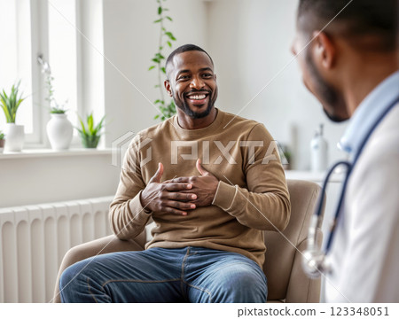 moment of dialogue with a smiling person talking to a therapist discussing treatment and rehabilitation training, the concept of physical health and well-being moment of dialogue with a smiling person talking to a therapist discussing treatment and rehabilitation training, the concept of physical health and well-being 123348051