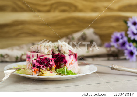 Homemade vegetable salad with potatoes, carrots and fish 123348817