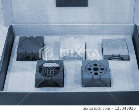Models printed on 3D printer from polyamide powder close-up. Detailed prototype created on 3D printer from plastic powder. 3D printing additive new powder technology. Multi Jet Fusion MJF technology 123348920
