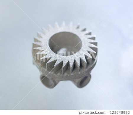 Object printed on 3D printer from metal powder using Metal Jet technology. High detailed detailing parts. Metal Jet. 3D-printed metal parts. Modern 3D printing, additive manufacturing technologies 123348922