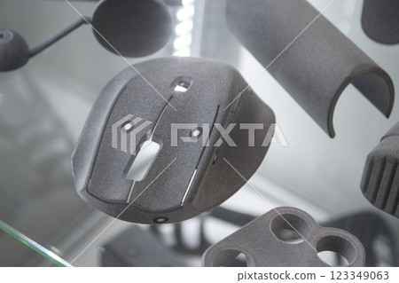 Model printed on 3D printer from grey polyamide powder close-up. Detailed prototype created on 3D printer from plastic powder. 3D printing additive powder technology, Multi Jet Fusion MJF technology 123349063