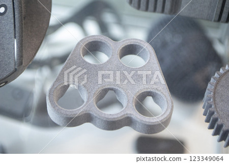 Model printed on 3D printer from grey polyamide powder close-up. Detailed prototype created on 3D printer from plastic powder. 3D printing additive powder technology, Multi Jet Fusion MJF technology 123349064