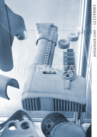 Model printed on 3D printer from grey polyamide powder close-up. Detailed prototype created on 3D printer from plastic powder. 3D printing additive powder technology, Multi Jet Fusion MJF technology 123349065