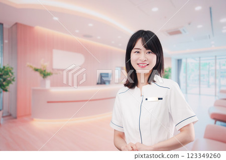 Young woman working at the clinic reception Young woman working at the clinic reception 123349260