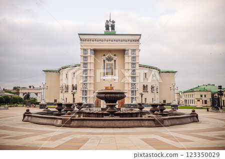 Ulan-Ude, Buryatia, Russia - August 9, 2021: The impressive musical theatre in Ulan-Ude, russia, stands majestically with its ornate fountain, creating a captivating scene 123350029
