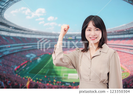 Young woman cheering at the stadium 123350304