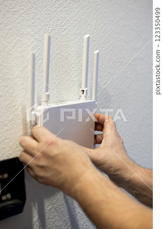 Installing a WiFi router with external antennas is crucial for optimal internet performance 123350499