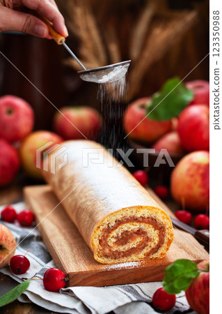 Homemade fresh baked delicious apple sponge roll cake 123350988