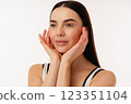 Portrait of Hands Touching Face on Isolated White Background 123351104