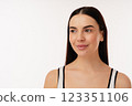 Portrait of a Smiling Woman with Neutral Background and Soft Lighting 123351106