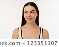 Portrait of a Confident Individual Smiling in Minimalistic Studio Lighting 123351107