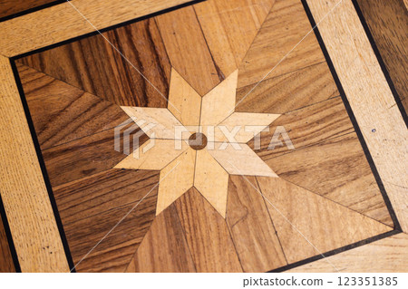 Wooden Parquet Flooring with Decorative Star Inlay Design 123351385