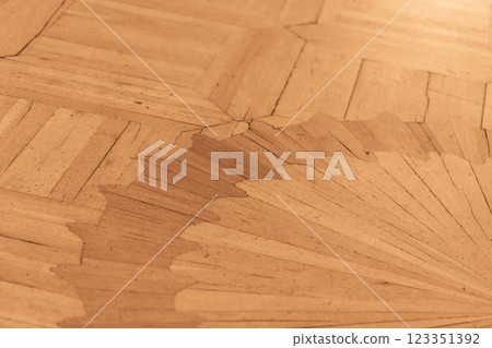Detailed View of a Wooden Floor With Angular Tile Patterns 123351392