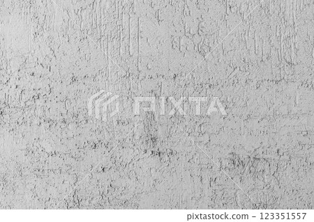 Textured closeup photo of a gray concrete wall showcasing detailed surface Textured closeup photo of a gray concrete wall showcasing detailed surface 123351557
