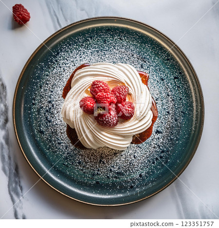 Elegant Meringue Dessert with Raspberries 123351757