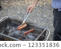 Sausages grilled on a barbecue 123351836
