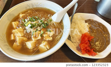 Scene from a restaurant (lunch set of spicy mapo ramen and mini curry) Scene from a restaurant (lunch set of spicy mapo ramen and mini curry) 123352323
