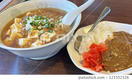 Scene from a restaurant (lunch set of spicy mapo ramen and mini curry) Scene from a restaurant (lunch set of spicy mapo ramen and mini curry) 123352326