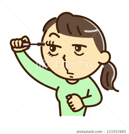 A woman doing mascara A woman doing mascara 123352983