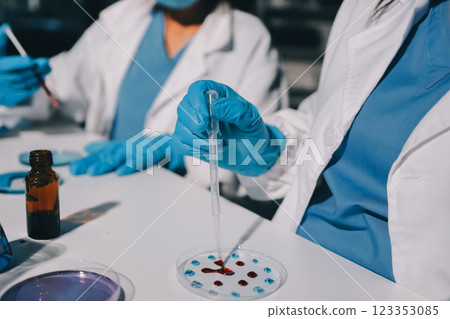 Researchers working in the clinical laboratory Researchers working in the clinical laboratory 123353085