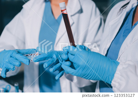 Researchers working in the clinical laboratory Researchers working in the clinical laboratory 123353127